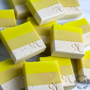 Lemon Craze Artisan soaps, stacked. Yellow, beige and white colored.